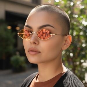 Gucci Women's Sunglasses with Pink and Gold Lenses